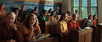 Movie still from “Indiana Jones and the Kingdom of the Crystal Skull” (2008), directed by Steven Spielberg – A group of people sitting in a classroom; Medium shot, High angle
