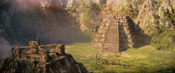 Movie still from “Indiana Jones and the Kingdom of the Crystal Skull” (2008), directed by Steven Spielberg – An ancient stone staircase in the middle of a field; Extreme Wide shot, High angle
