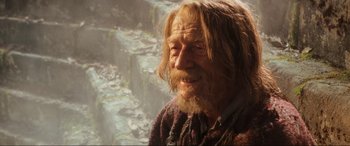 Movie still from “Indiana Jones and the Kingdom of the Crystal Skull” (2008), directed by Steven Spielberg – An old man with long hair and a long beard; Close Up shot, Over the shoulder angle