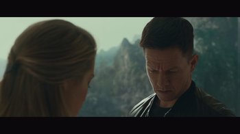 Movie still from “Infinite” (2021), directed by Antoine Fuqua – A man and a woman looking at one another; Close Up shot, Over the shoulder angle