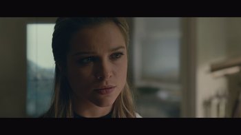 Movie still from “Infinite” (2021), directed by Antoine Fuqua – A person with long blonde hair; Close Up shot, Low angle