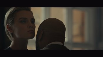 Movie still from “Infinite” (2021), directed by Antoine Fuqua – A man and a woman looking at each other; Close Up shot, Low angle