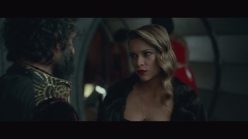 Movie still from “Infinite” (2021), directed by Antoine Fuqua – A man and a woman are standing next to each other; Close Up shot, Over the shoulder angle