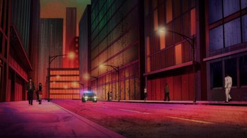 Movie still from “Injustice” (2021), directed by Matt Peters – A car is driving down the street at night; Extreme Wide shot, High angle