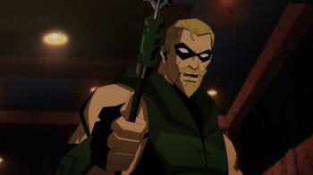 Movie still from “Injustice” (2021), directed by Matt Peters – A man holding a green arrow up to his face; Close Up shot, Over the shoulder angle