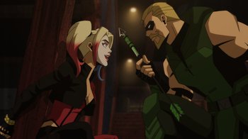 Movie still from “Injustice” (2021), directed by Matt Peters – A couple of people sitting next to each other in a room; Medium shot, Over the shoulder angle