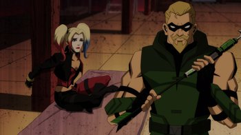 Movie still from “Injustice” (2021), directed by Matt Peters – A woman sitting on the ground next to a man with an arrow; Medium shot, Over the shoulder angle