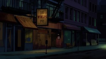 Movie still from “Injustice” (2021), directed by Matt Peters – A street scene with a street sign and a building; Extreme Wide shot, High angle