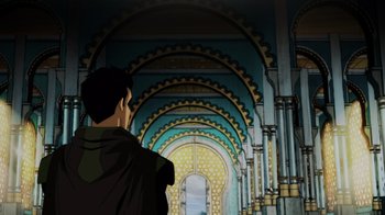 Movie still from “Injustice” (2021), directed by Matt Peters – A man standing in front of an archway; Wide shot, Low angle