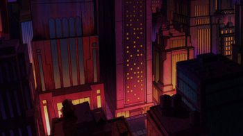 Movie still from “Injustice” (2021), directed by Matt Peters – An image of a city at night with lights on buildings; Extreme Wide shot, High angle