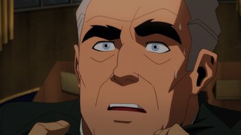 Movie still from “Injustice” (2021), directed by Matt Peters – An older man with a bald head and a goatee looking upward; Close Up shot, High angle