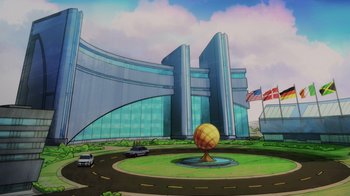 Movie still from “Injustice” (2021), directed by Matt Peters – An animated picture of a building with a globe in the center of it; Extreme Wide shot, Low angle