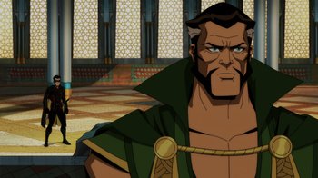 Movie still from “Injustice” (2021), directed by Matt Peters – A person wearing a costume; Close Up shot, Over the shoulder angle