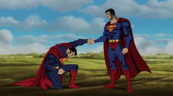 Movie still from “Injustice” (2021), directed by Matt Peters – Two men in superman costumes shaking hands in a field; Wide shot, Low angle