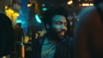 Movie still from “Atlanta” (2016), created by Donald Glover – A person wearing a jacket; Close Up shot, Over the shoulder angle