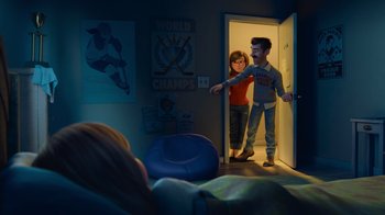 Movie still from “Inside Out” (2015), directed by Pete Docter – A man and a woman standing in a room; Wide shot, High angle