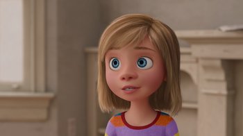 Movie still from “Inside Out” (2015), directed by Pete Docter – A cartoon girl with blonde hair and blue eyes; Close Up shot, Over the shoulder angle