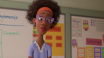 Movie still from “Inside Out” (2015), directed by Pete Docter – A woman with glasses is standing in front of a wall; Close Up shot, Over the shoulder angle