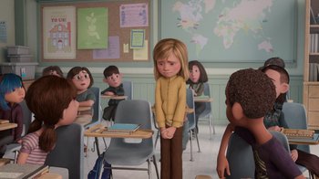 Movie still from “Inside Out” (2015), directed by Pete Docter – A cartoon of a little girl standing in front of a class room; Wide shot, Over the shoulder angle