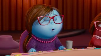 Movie still from “Inside Out” (2015), directed by Pete Docter – A cartoon of a woman sitting at a table with a coffee cup; Medium shot, Over the shoulder angle
