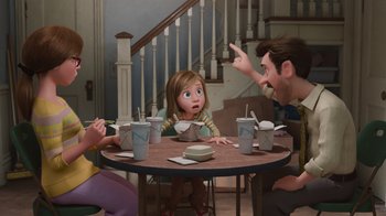 Movie still from “Inside Out” (2015), directed by Pete Docter – A group of people sitting at a table with cups; Medium shot, Over the shoulder angle