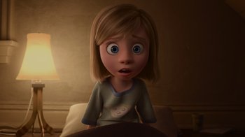 Movie still from “Inside Out” (2015), directed by Pete Docter – A cartoon of a little girl looking surprised at the camera; Close Up shot, High angle