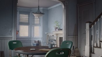 Movie still from “Inside Out” (2015), directed by Pete Docter – A room with a table and chairs and a fireplace; Wide shot, High angle
