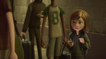 Movie still from “Inside Out” (2015), directed by Pete Docter – A young girl standing in front of a group of young people with suitcases; Medium shot, Over the shoulder angle