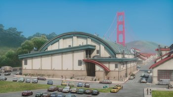 Movie still from “Inside Out” (2015), directed by Pete Docter – A large building that has cars parked in front of it; Extreme Wide shot, High angle