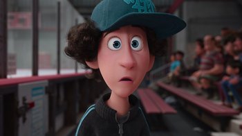 Movie still from “Inside Out” (2015), directed by Pete Docter – A person with a hat and a surprised look on their face; Close Up shot, High angle