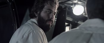 Movie still from “Insidious” (2010), directed by James Wan – A man with a goatee and a beard; Close Up shot, Low angle