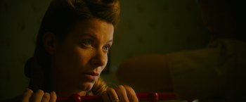 Movie still from “Insidious: The Last Key” (2018), directed by Adam Robitel – A beautiful woman with a ring on her right hand; Close Up shot, Over the shoulder angle