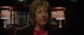 Movie still from “Insidious: The Last Key” (2018), directed by Adam Robitel – An older woman sitting in front of a window; Close Up shot, Over the shoulder angle