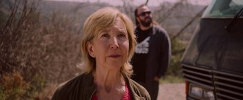 Movie still from “Insidious: The Last Key” (2018), directed by Adam Robitel – An older woman standing next to an older man; Close Up shot, Low angle