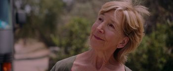 Movie still from “Insidious: The Last Key” (2018), directed by Adam Robitel – An older woman looking up into the sky; Close Up shot, Low angle