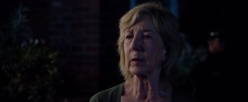Movie still from “Insidious: The Last Key” (2018), directed by Adam Robitel – An older woman is looking into the distance; Close Up shot, Low angle