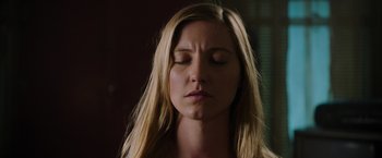 Movie still from “Insidious: The Last Key” (2018), directed by Adam Robitel – A woman with her eyes closed with her eyes wide open; Close Up shot, Low angle