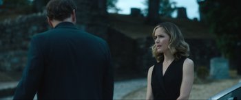 Movie still from “Insidious: The Red Door” (2023), directed by Patrick Wilson – A man and a woman standing next to each other outside; Medium shot, Over the shoulder angle