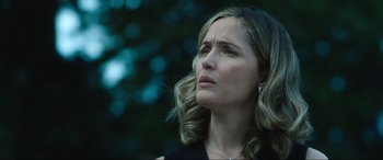 Movie still from “Insidious: The Red Door” (2023), directed by Patrick Wilson – A person looking up at the sky; Close Up shot, Low angle