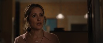 Movie still from “Insidious: The Red Door” (2023), directed by Patrick Wilson – A person wearing a pink shirt; Close Up shot, Over the shoulder angle