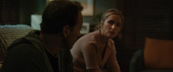 Movie still from “Insidious: The Red Door” (2023), directed by Patrick Wilson – A man and a woman sitting in front of each other; Close Up shot, Over the shoulder angle