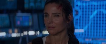 Movie still from “Interceptor” (2022), directed by Matthew Reilly – A person with a knife on her face; Close Up shot, Over the shoulder angle