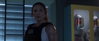 Movie still from “Interceptor” (2022), directed by Matthew Reilly – A person wearing a uniform; Close Up shot, Low angle