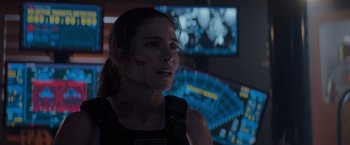 Movie still from “Interceptor” (2022), directed by Matthew Reilly – A person in front of a monitor; Close Up shot, Over the shoulder angle