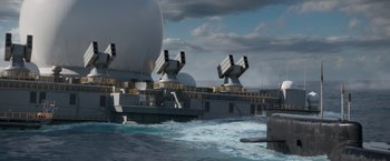 Movie still from “Interceptor” (2022), directed by Matthew Reilly – An image of an aircraft carrier in the water; Extreme Wide shot, High angle