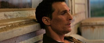 Movie still from “Interstellar” (2014), directed by Christopher Nolan – A person wearing a brown jacket; Close Up shot, Low angle