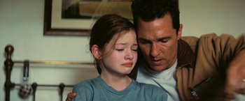 Movie still from “Interstellar” (2014), directed by Christopher Nolan – A man and a little girl sitting next to each other; Close Up shot, Over the shoulder angle