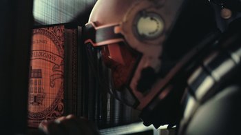 Movie still from “Interstellar” (2014), directed by Christopher Nolan – A person wearing a helmet and a helmet; Extreme Close Up shot, Over the shoulder angle