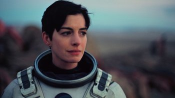 Movie still from “Interstellar” (2014), directed by Christopher Nolan – A person wearing a space suit; Close Up shot, Low angle
