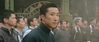 Movie still from “Ip Man” (2008), directed by Wilson Yip – A group of men standing in front of each other; Close Up shot, Low angle